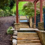 Professional walkway and wall construction by Apex Outdoors