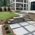 Custom stone fire pit installation by Apex Outdoors in North Georgia, enhancing outdoor living spaces and curb appeal