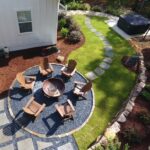 Drone view of Apex Outdoors patio and fire pit landscaping project