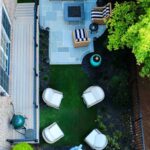 Apex Outdoors professional turf installation with modern outdoor design